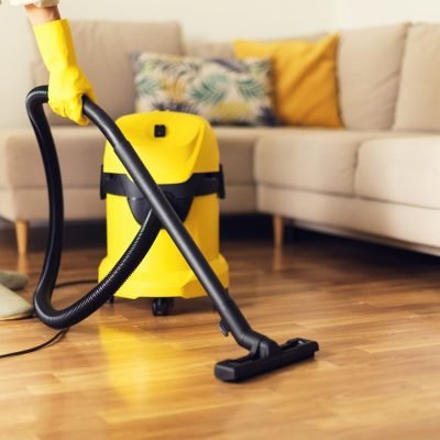 woman-cleaning-sofa-with-yellow-vacuum-cleaner-copy-space-cleaning-service-concept.jpg Upholstery Cleaning Services in Dubai